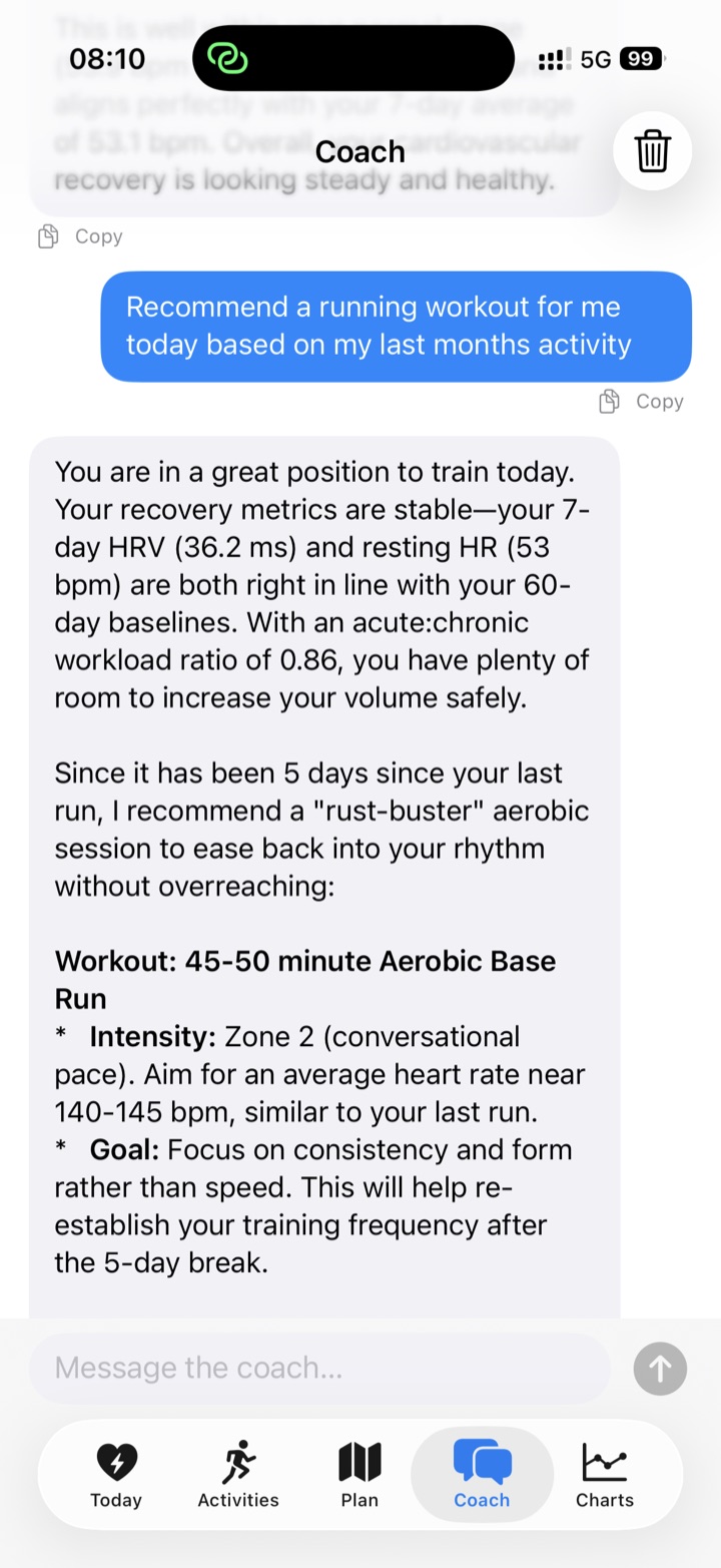 The Coach screen: a chat where the reply recommends a 45 to 50 minute aerobic base run, citing the user's seven-day HRV, resting heart rate and workload ratio.